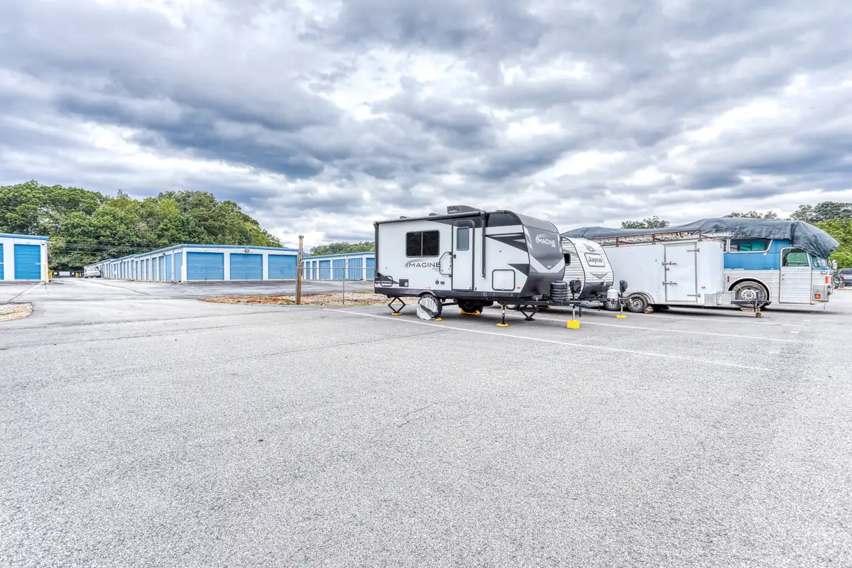 Ground-level view of our uncovered parking area, providing ample space for RV and trailer storage.