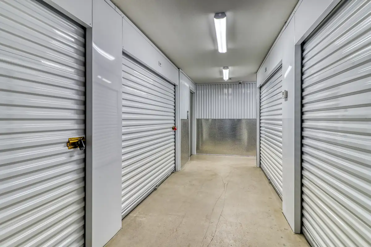 Interior hallway lined with storage unit doors at MyPlace Self Storage Casa Grande.