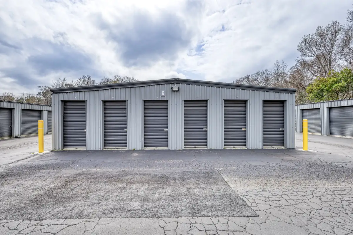 Larger drive-up storage units and paved turning area at MyPlace Self-Storage Charleston.