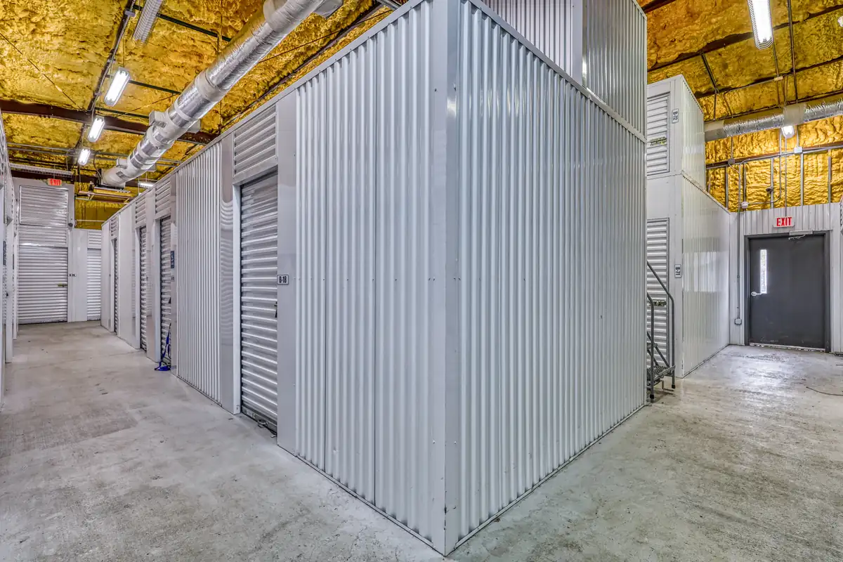 Interior storage building with ground-level units and roll-up doors at MyPlace Self-Storage in Charleston, SC.