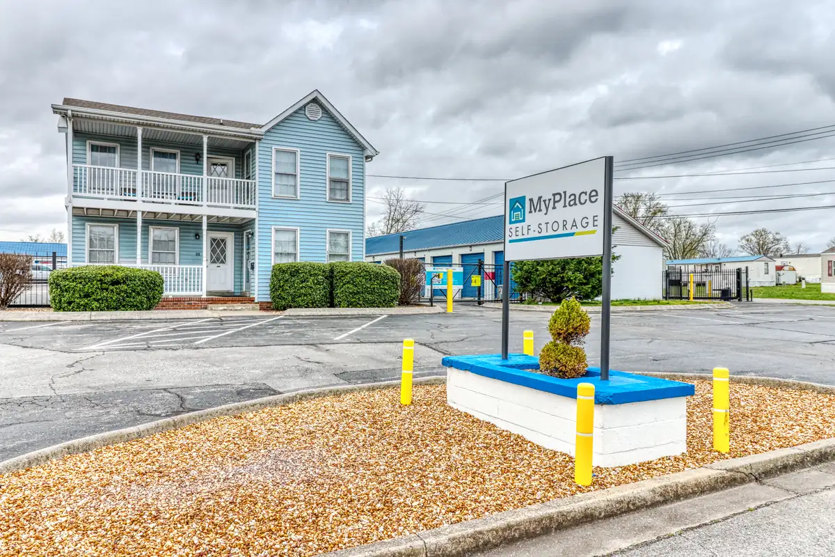 Electronic gate keypad and fenced entrance at MyPlace Self-Storage on Collier Road.
