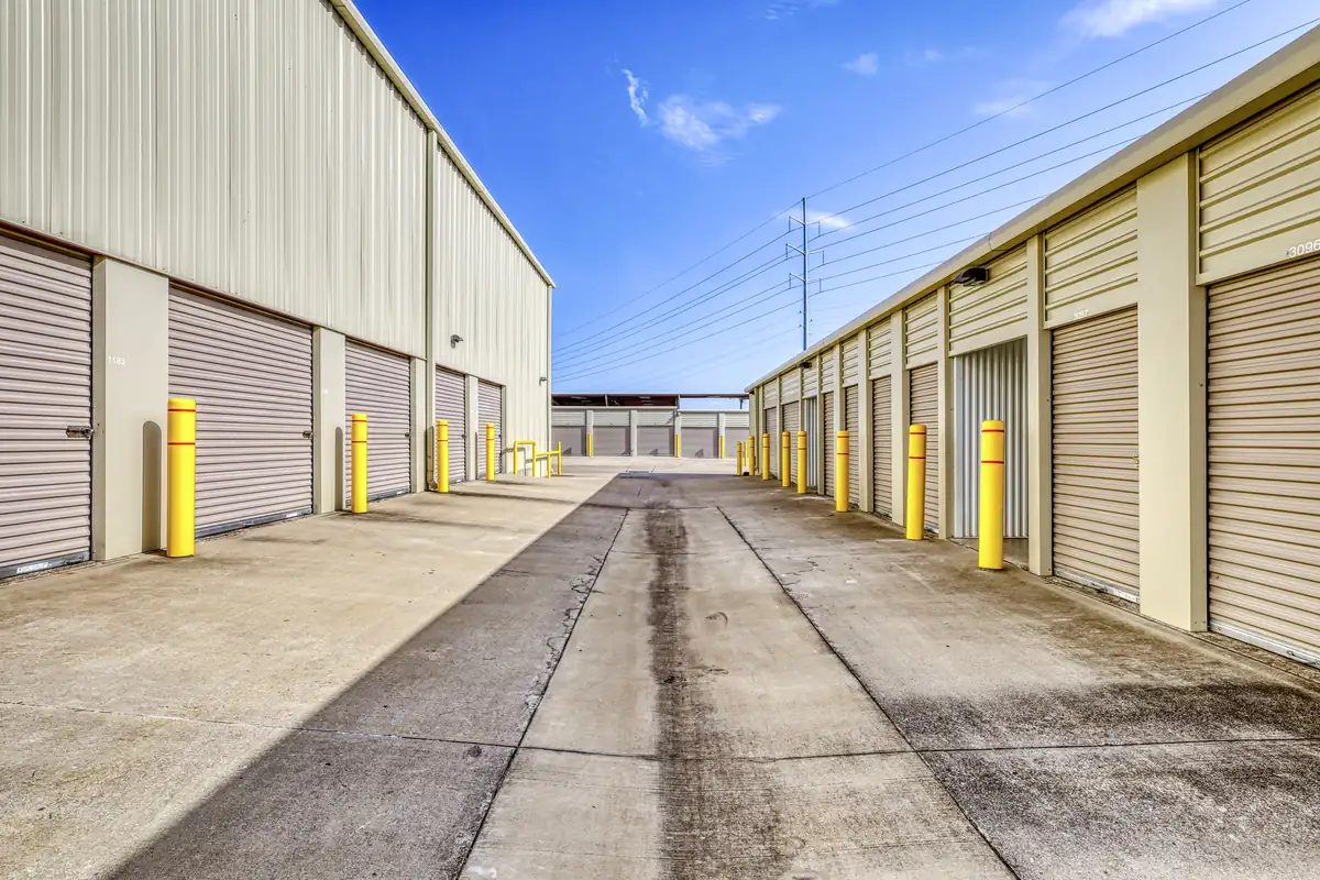 Drive aisle between rows of drive-up storage units at MyPlace Self-Storage on East University Drive.