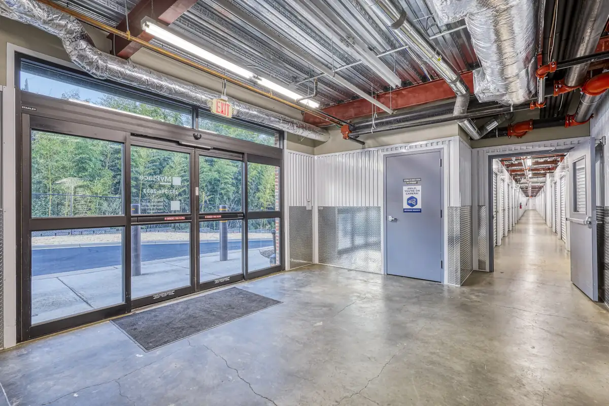 Interior loading area and glass entry doors at MyPlace Self-Storage on Pelham Road.