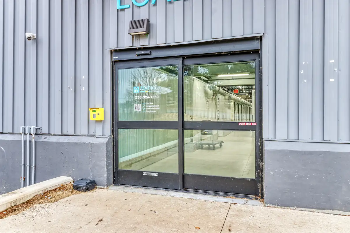 Building entrance and glass doors at MyPlace Self-Storage on N 6th Street in Lafayette, IN.