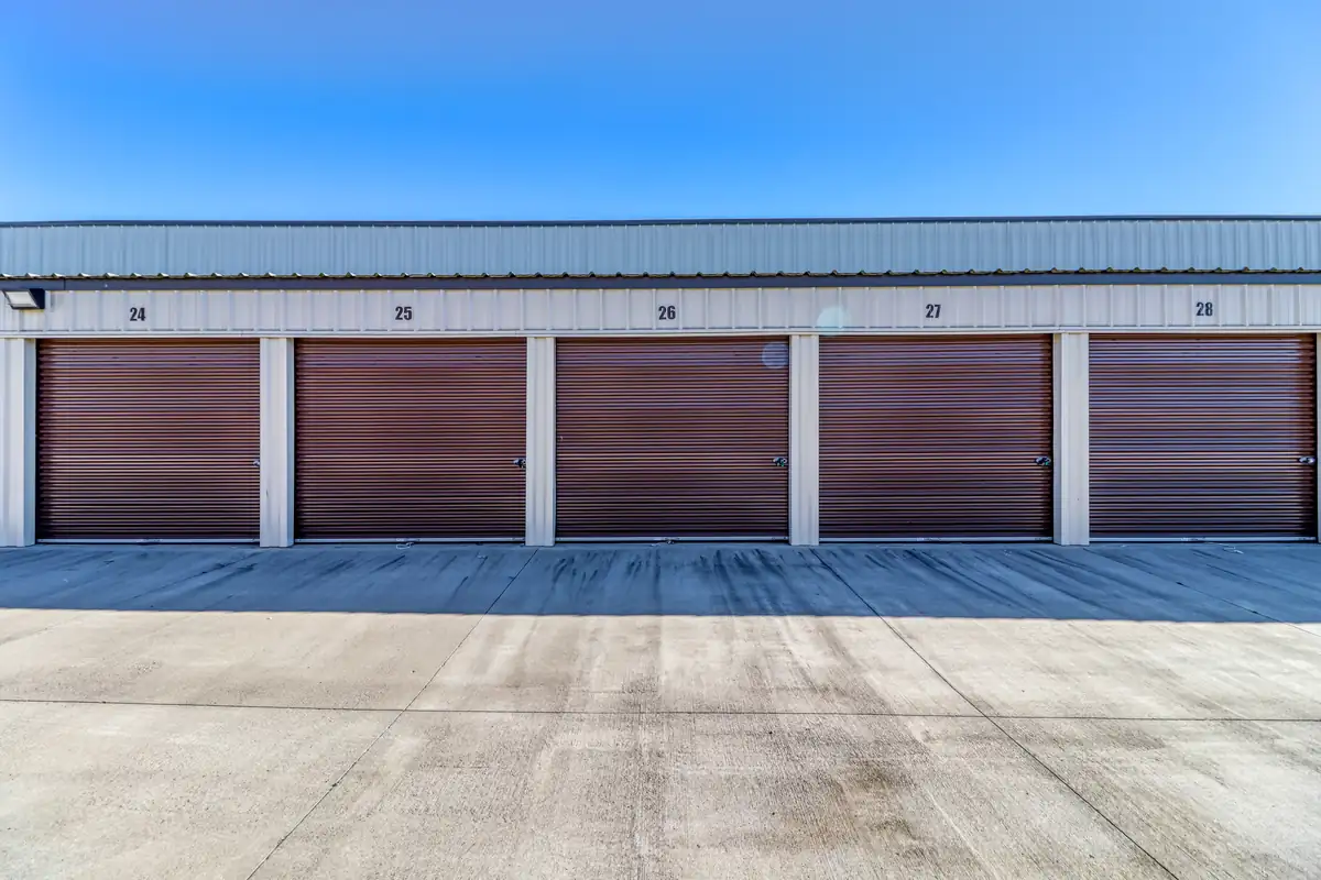 Row of larger drive-up storage units with roll-up doors at MyPlace Self-Storage on Leanna Central Valley Road.