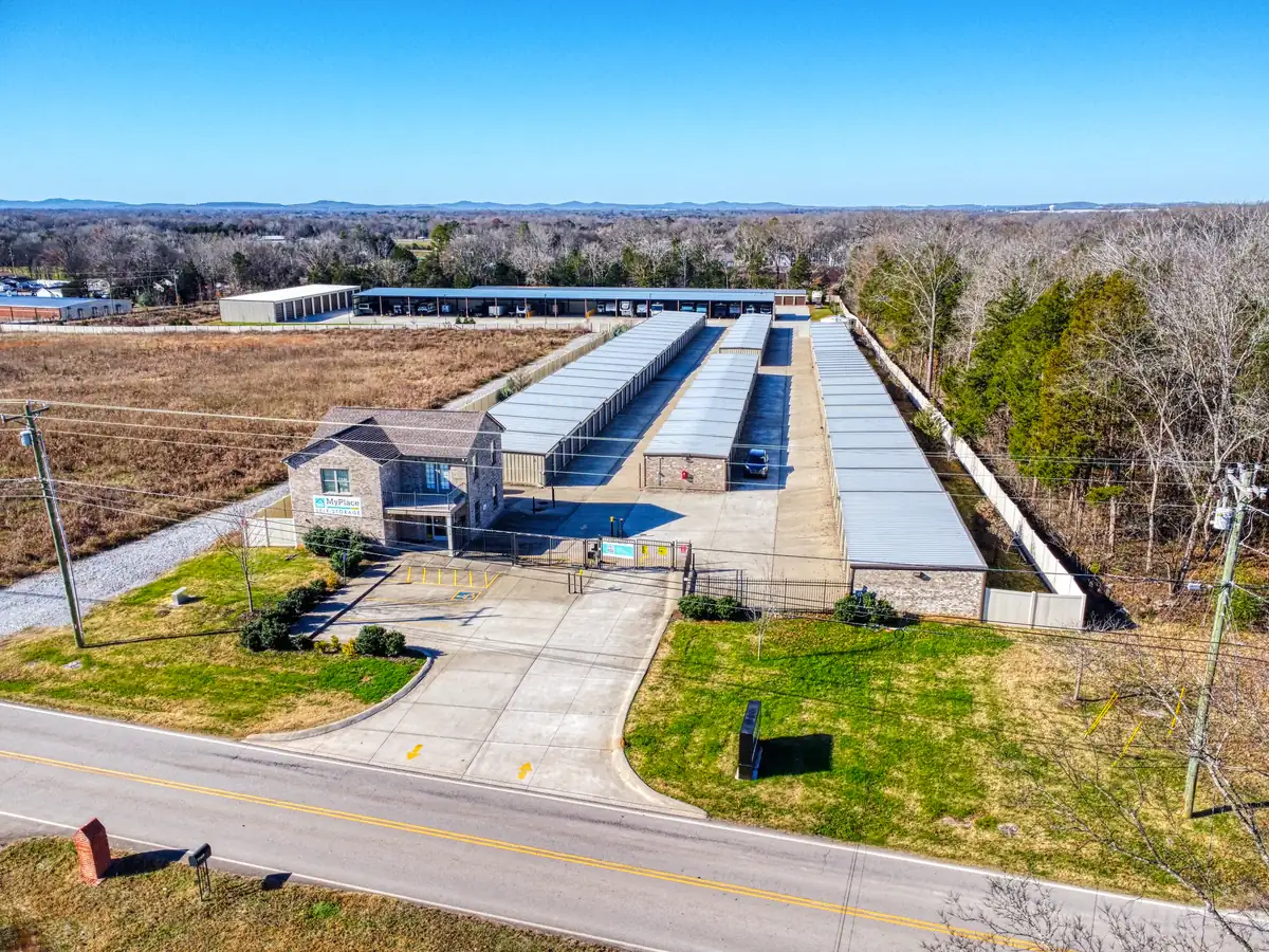 Aerial view of MyPlace Self-Storage buildings and covered parking on Leanna Central Valley Road.