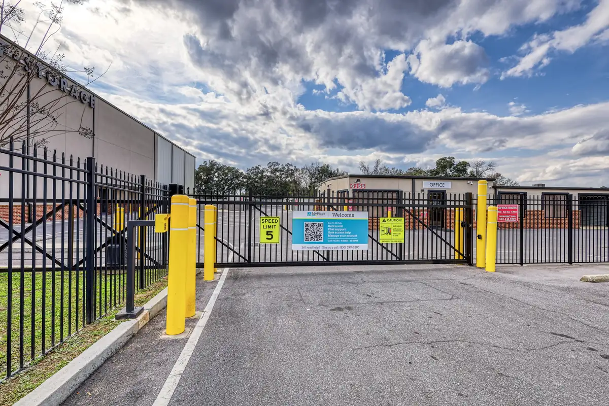 Electronic gate entrance and fenced drive at MyPlace Self-Storage on N Palafox Street.