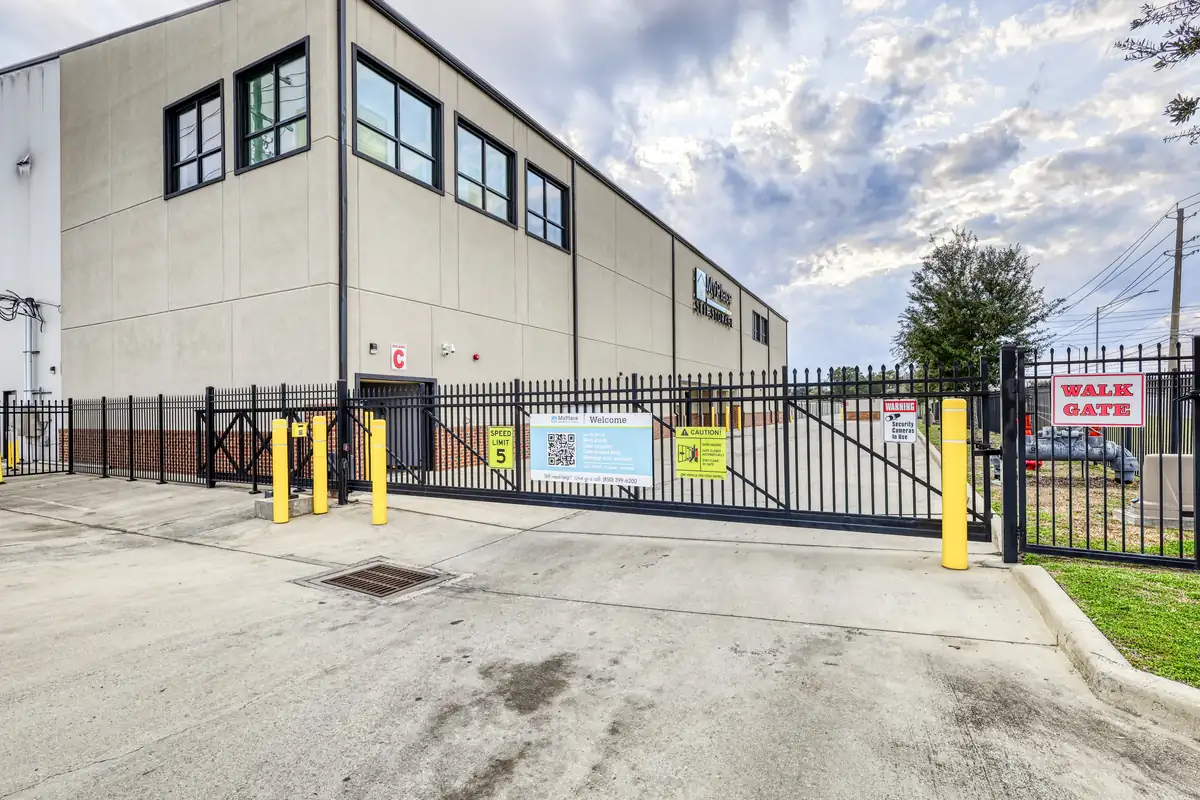 Fenced electronic gate entrance at MyPlace Self-Storage in Pensacola, Florida.