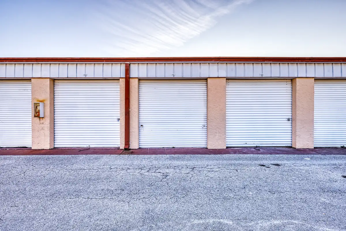 Row of roll-up doors on ground-level drive-up units at MyPlace Self-Storage on Cooper Street.
