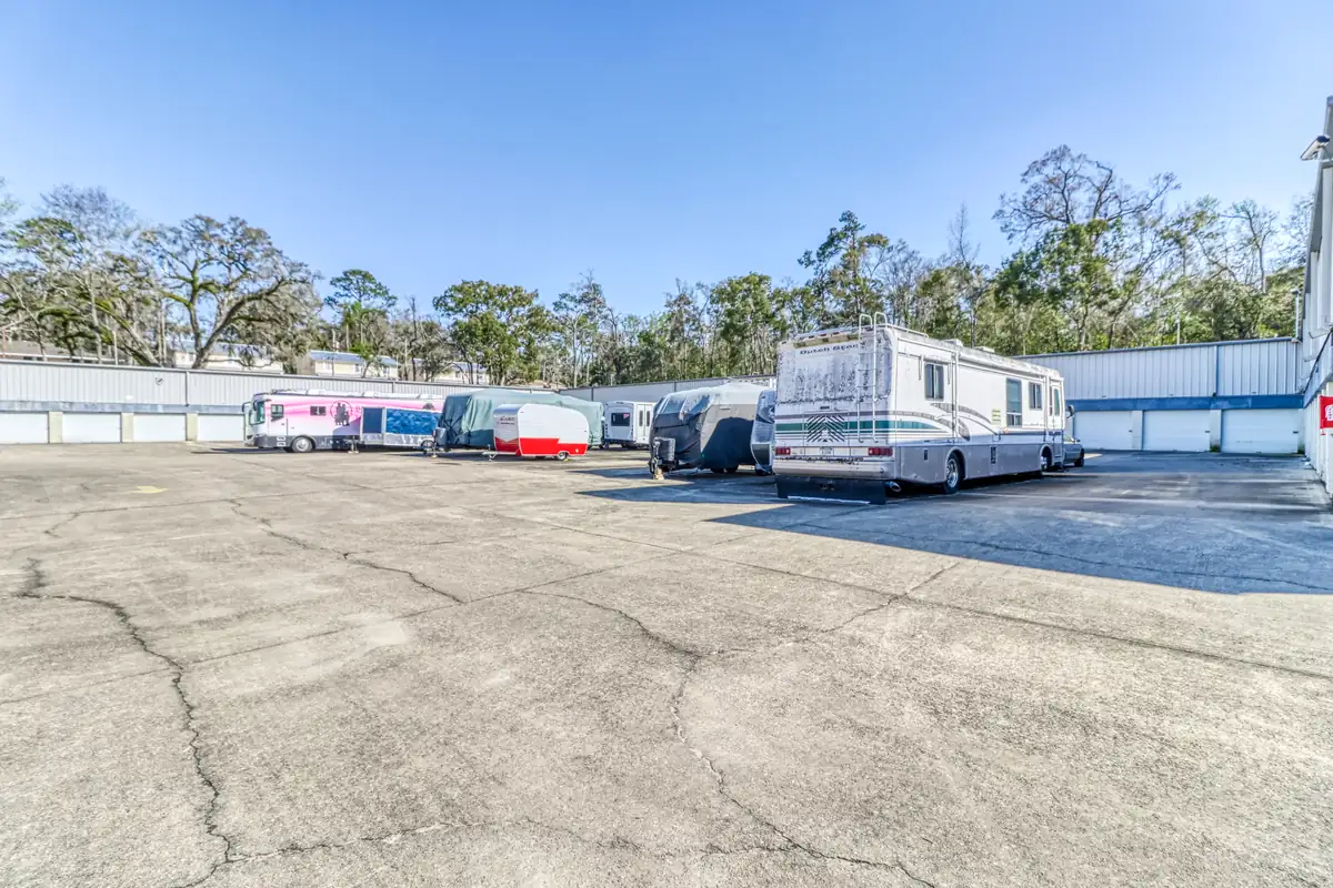 Open paved parking spaces for RVs, boats, and trailers at MyPlace Self-Storage Tallahassee.