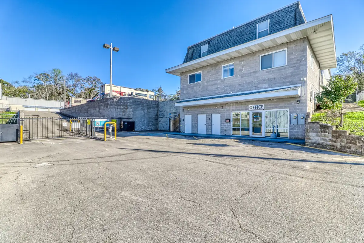 Two-story storage building and paved drive at MyPlace Self-Storage on S Monroe Street in Tallahassee, FL.